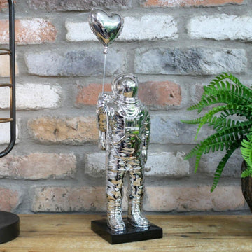 Chrome Astronaut Sculpture